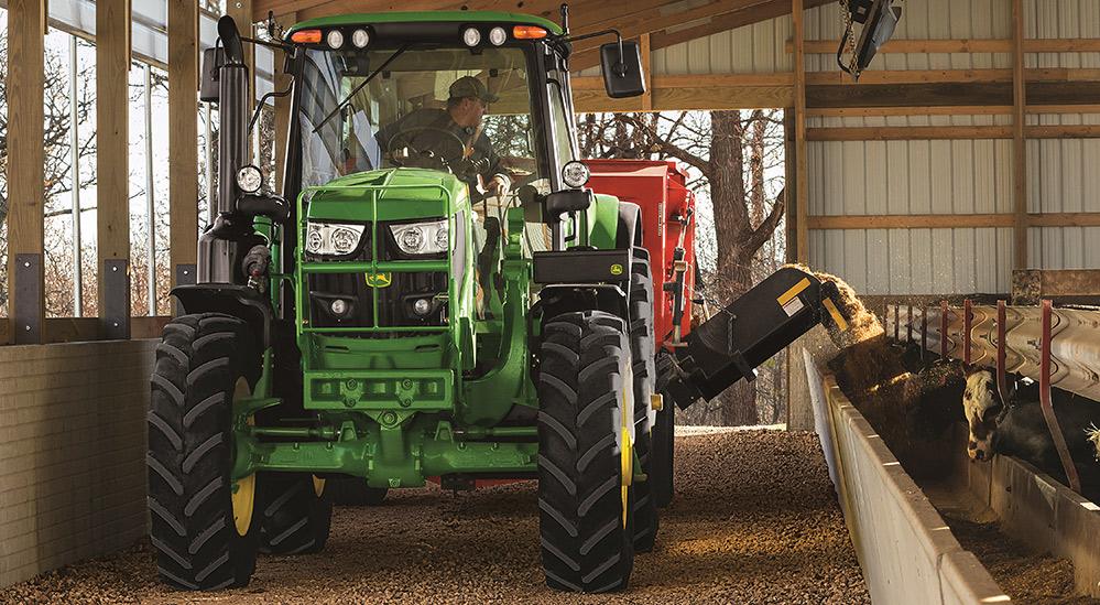 A John Deere tractor in a barn